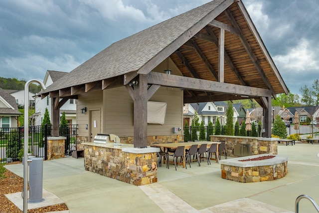 5735 Acadia Dr, Chattanooga, TN 37415 - view of patio / terrace with a fire pit, area for grilling, outdoor wet bar, a gazebo, and fence