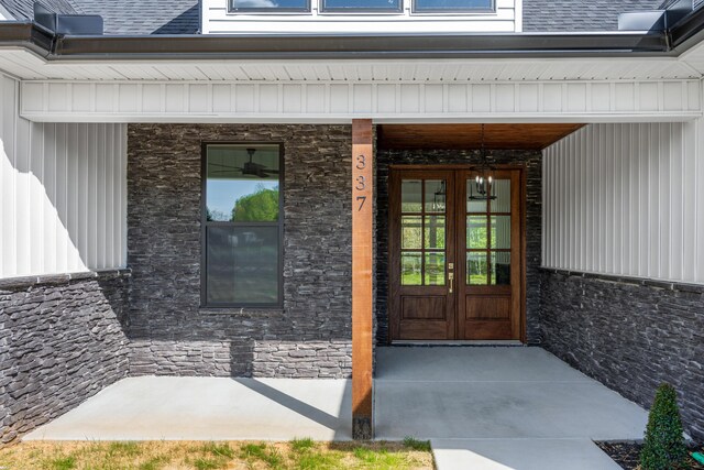 337 Hunter Trl, Trenton, GA 30752 - doorway to property featuring stone siding, french doors, and board and batten siding