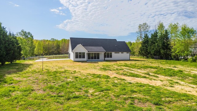 337 Hunter Trl, Trenton, GA 30752 - back of property with fence and a lawn