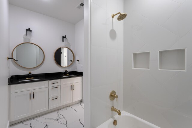 337 Hunter Trl, Trenton, GA 30752 - full bath with a sink, marble finish floor, shower / bath combination, double vanity, and visible vents