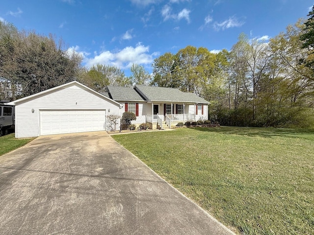 1319 Jacobs Ave, Bridgeport, AL 35740 - ranch-style house with an attached garage, driveway, a front lawn, and covered porch