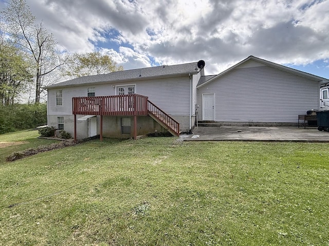 1319 Jacobs Ave, Bridgeport, AL 35740 - rear view of house featuring a yard, stairs, a deck, and a patio