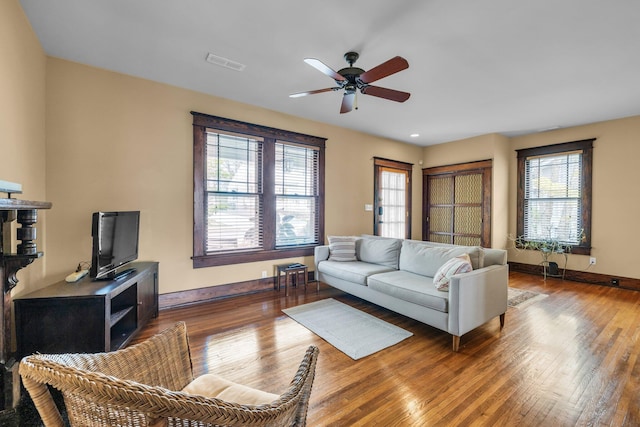 212 Jarnigan Ave, Chattanooga, TN 37405 - living room with baseboards, ceiling fan, visible vents, and wood-type flooring