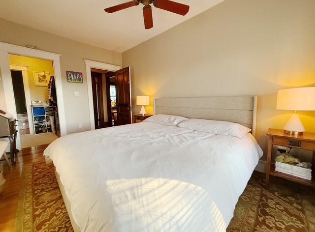 212 Jarnigan Ave, Chattanooga, TN 37405 - bedroom with a ceiling fan, vaulted ceiling, and wood finished floors