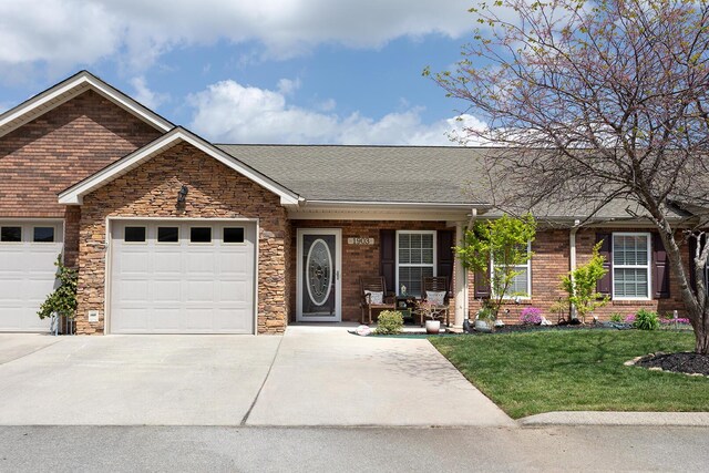 1903 Applebrook Dr, Rossville, GA 30741 - ranch-style home featuring a garage, concrete driveway, a front lawn, roof with shingles, and covered porch