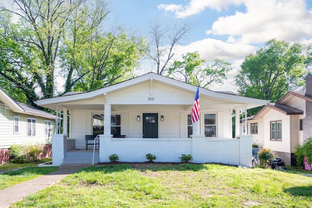 2510 Vine St, Chattanooga, TN 37404 - bungalow-style home featuring a front lawn and covered porch