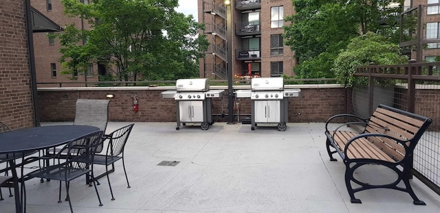 200 Manufacturers Rd Apt 428, Chattanooga, TN 37405 - view of patio / terrace featuring grilling area and outdoor dining area
