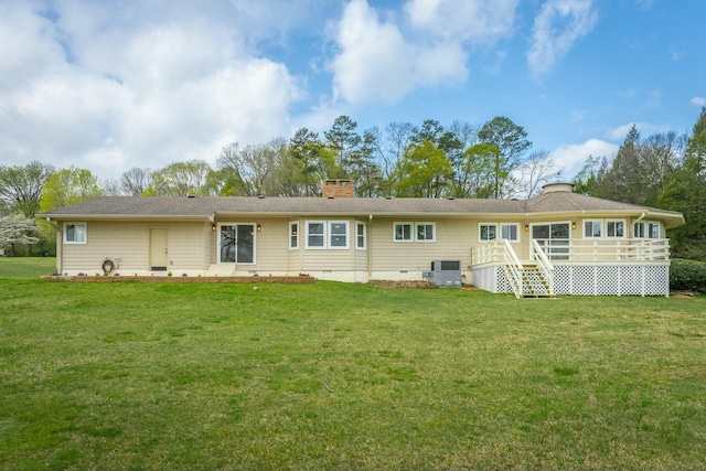 2041 Linwood Cir, Soddy Daisy, TN 37379 - back of house featuring a wooden deck, a lawn, and a chimney