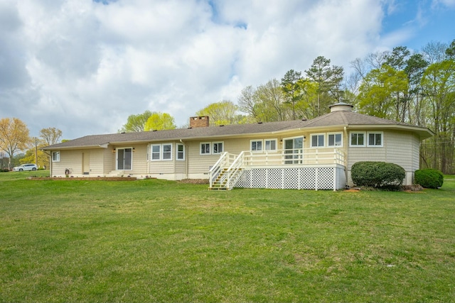 2041 Linwood Cir, Soddy Daisy, TN 37379 - back of property featuring a deck, stairs, a lawn, and a chimney