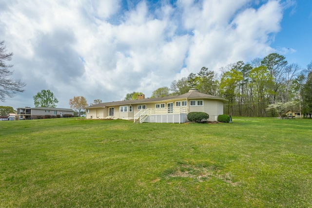 2041 Linwood Cir, Soddy Daisy, TN 37379 - rear view of property with a yard and a chimney