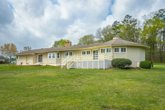 2041 Linwood Cir, Soddy Daisy, TN 37379 - back of house featuring a deck, stairs, a lawn, and a chimney