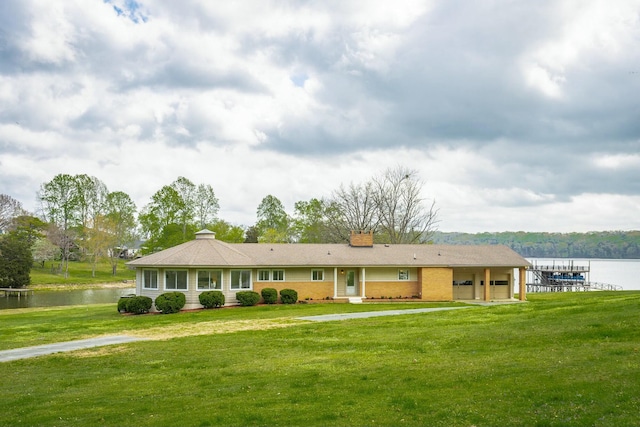 2041 Linwood Cir, Soddy Daisy, TN 37379 - ranch-style home featuring a water view, a chimney, and a front lawn