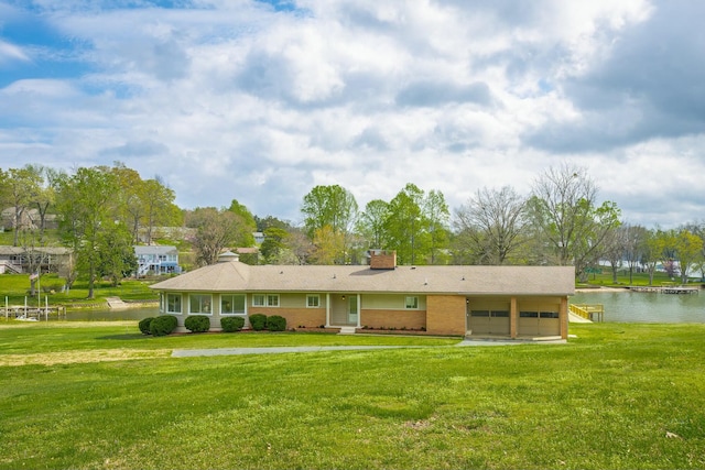 2041 Linwood Cir, Soddy Daisy, TN 37379 - ranch-style house with a water view, a front yard, brick siding, a chimney, and a garage