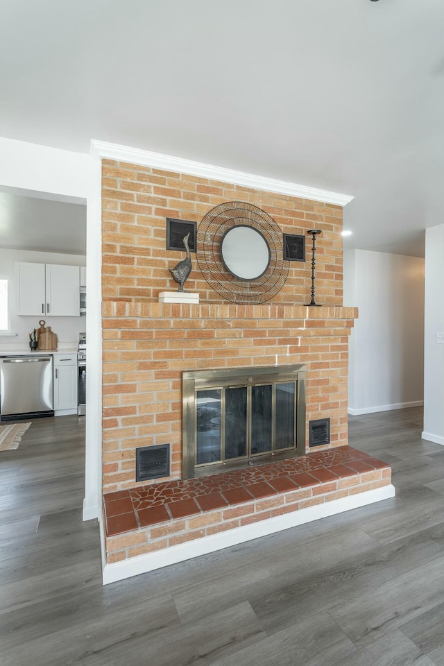 2041 Linwood Cir, Soddy Daisy, TN 37379 - interior details featuring dishwasher, a fireplace, and visible vents