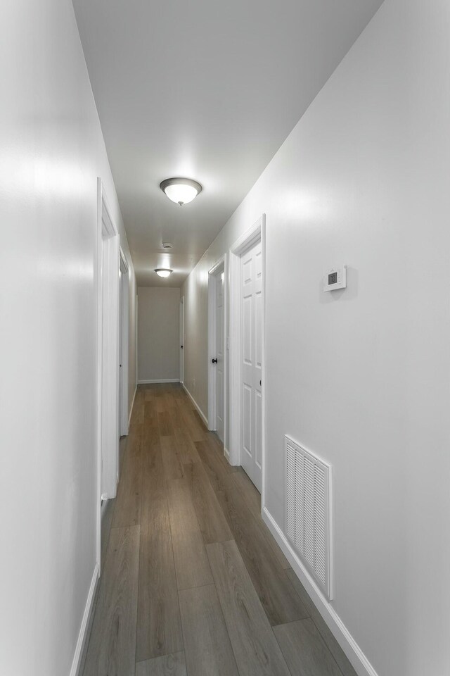 2041 Linwood Cir, Soddy Daisy, TN 37379 - hallway with wood finished floors, baseboards, and visible vents