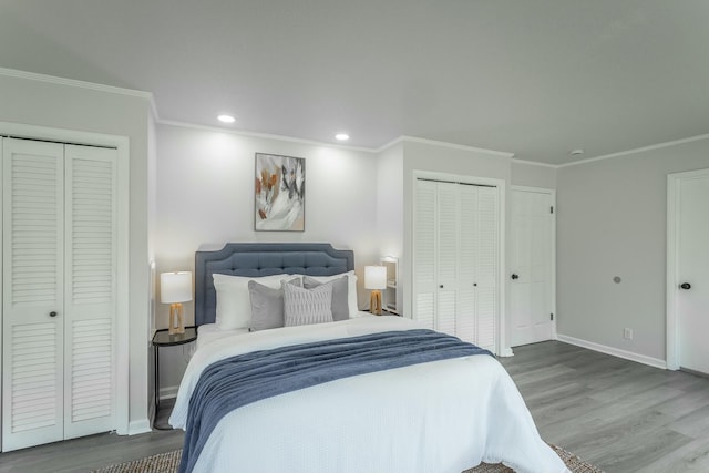 2041 Linwood Cir, Soddy Daisy, TN 37379 - bedroom with baseboards, ornamental molding, recessed lighting, multiple closets, and wood finished floors