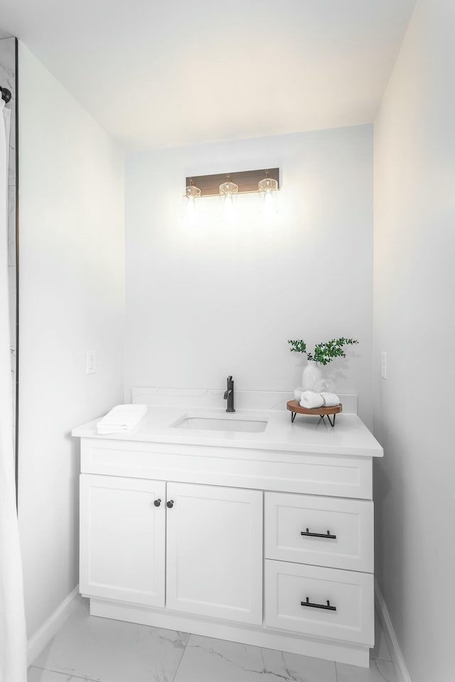 2041 Linwood Cir, Soddy Daisy, TN 37379 - bathroom featuring vanity, marble finish floor, and baseboards