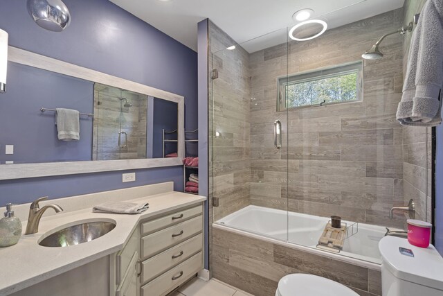 811 Snow St, Chattanooga, TN 37405 - full bath featuring tiled shower / bath combo, toilet, vanity, and tile patterned floors