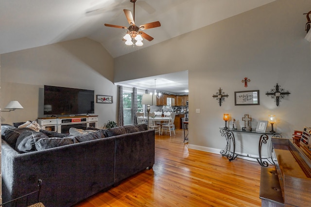 901 Haggard Rd, Ringgold, GA 30736 - living area featuring a ceiling fan, light wood finished floors, and high vaulted ceiling