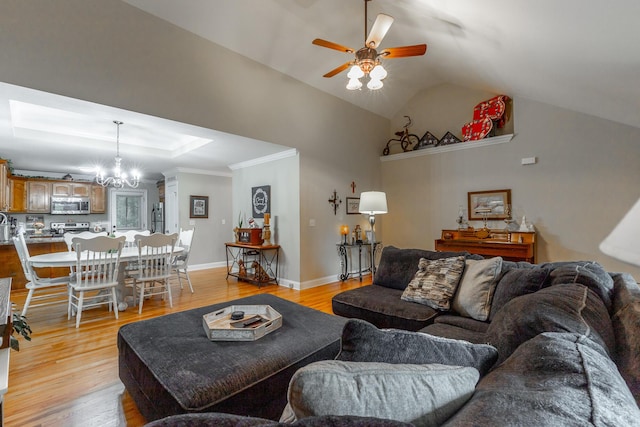 901 Haggard Rd, Ringgold, GA 30736 - living area with ceiling fan, light wood-style floors, lofted ceiling, crown molding, and a chandelier