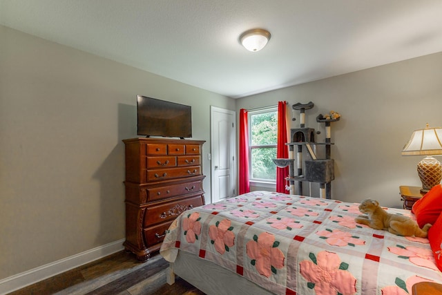 901 Haggard Rd, Ringgold, GA 30736 - bedroom with wood finished floors and baseboards