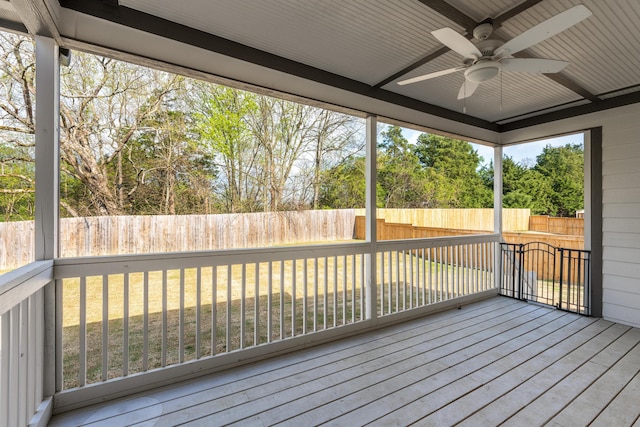 wooden deck featuring a fenced backyard and a ceiling fan