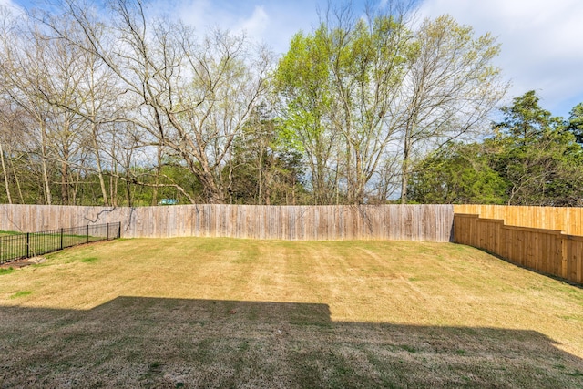 view of yard featuring a fenced backyard