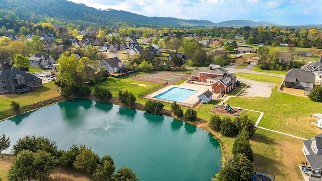 bird's eye view featuring a water and mountain view and a residential view