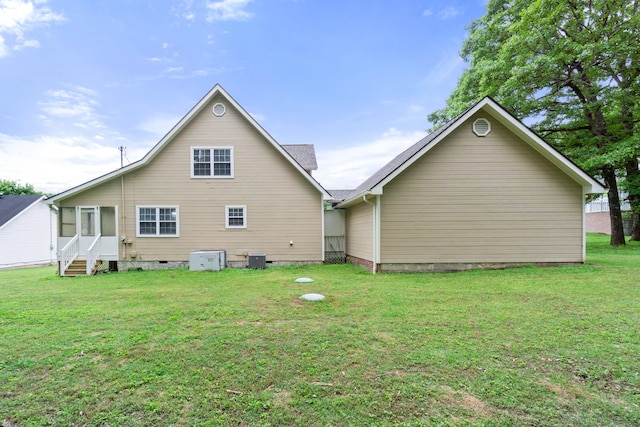 82 Andrew Rd, Ringgold, GA 30736 - back of property featuring a lawn, entry steps, crawl space, and central AC unit