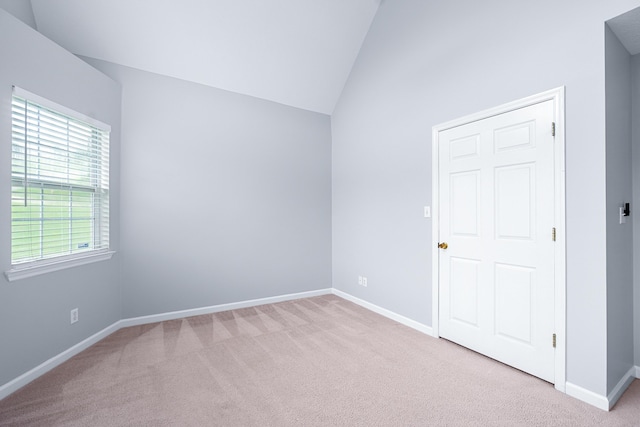 82 Andrew Rd, Ringgold, GA 30736 - carpeted spare room with vaulted ceiling and baseboards