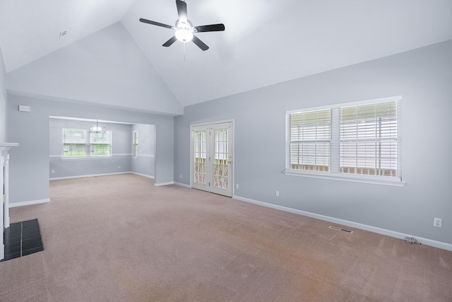 82 Andrew Rd, Ringgold, GA 30736 - unfurnished living room featuring high vaulted ceiling, ceiling fan, plenty of natural light, a chandelier, and carpet flooring