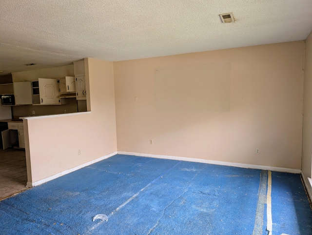 4831 Bonny Lake Ln, Chattanooga, TN 37416 - unfurnished room featuring visible vents, a textured ceiling, and baseboards