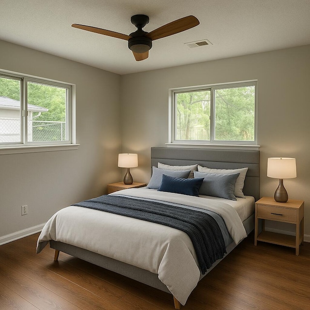 4831 Bonny Lake Ln, Chattanooga, TN 37416 - bedroom with visible vents, baseboards, a ceiling fan, and wood-type flooring
