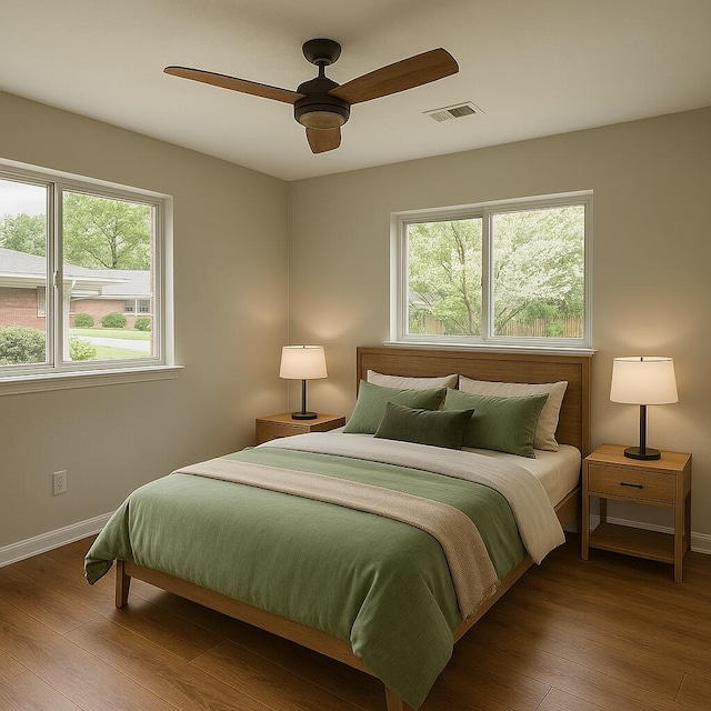 4831 Bonny Lake Ln, Chattanooga, TN 37416 - bedroom with ceiling fan, visible vents, baseboards, and wood finished floors