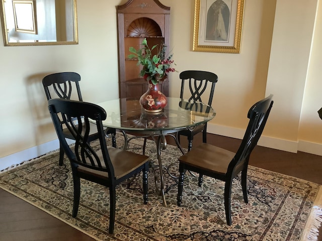 dining room featuring baseboards