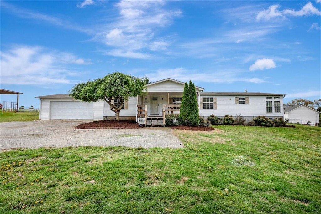 200 Blevins Ln, Dayton, TN 37321 - view of front of home featuring a porch and a front yard