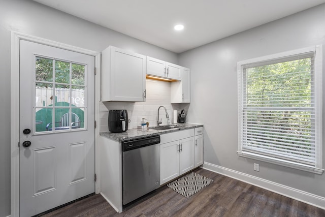418 Thompson St, Chattanooga, TN 37405 - kitchen with light stone counters, white cabinetry, backsplash, dishwasher, and a sink