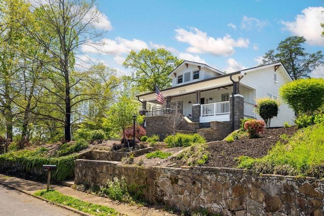 1209 Highland Dr, Chattanooga, TN 37405 - view of front of property featuring stairway, a porch, and stone siding