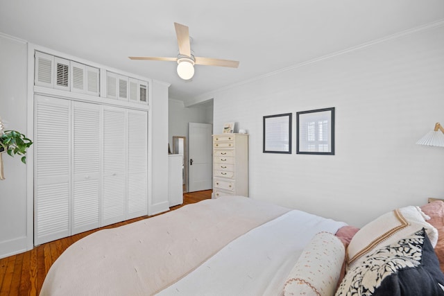 1209 Highland Dr, Chattanooga, TN 37405 - bedroom with ceiling fan, a closet, ornamental molding, and wood finished floors