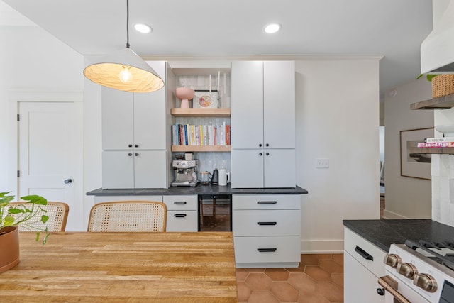 1209 Highland Dr, Chattanooga, TN 37405 - kitchen featuring recessed lighting, open shelves, white gas range, white cabinets, and decorative light fixtures
