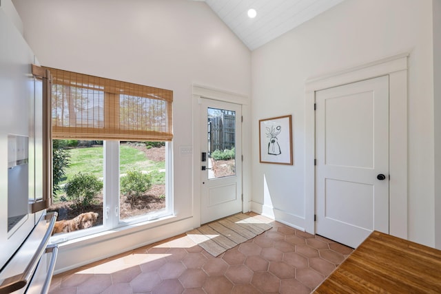 1209 Highland Dr, Chattanooga, TN 37405 - tiled entryway featuring baseboards, vaulted ceiling, and recessed lighting