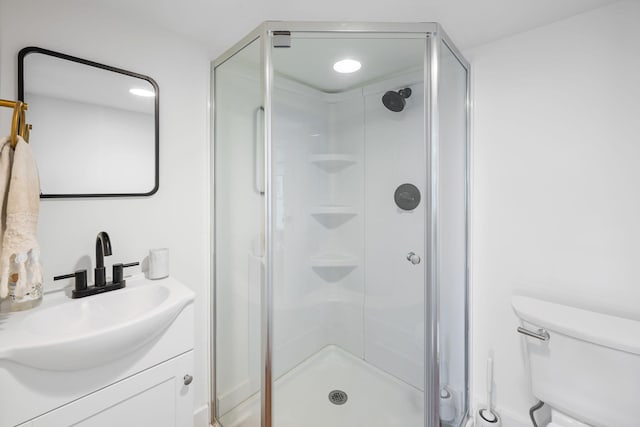 1209 Highland Dr, Chattanooga, TN 37405 - bathroom with toilet, vanity, and a stall shower