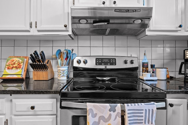 219 Martin Rd, Chattanooga, TN 37415 - kitchen with electric range, extractor fan, decorative backsplash, and white cabinetry