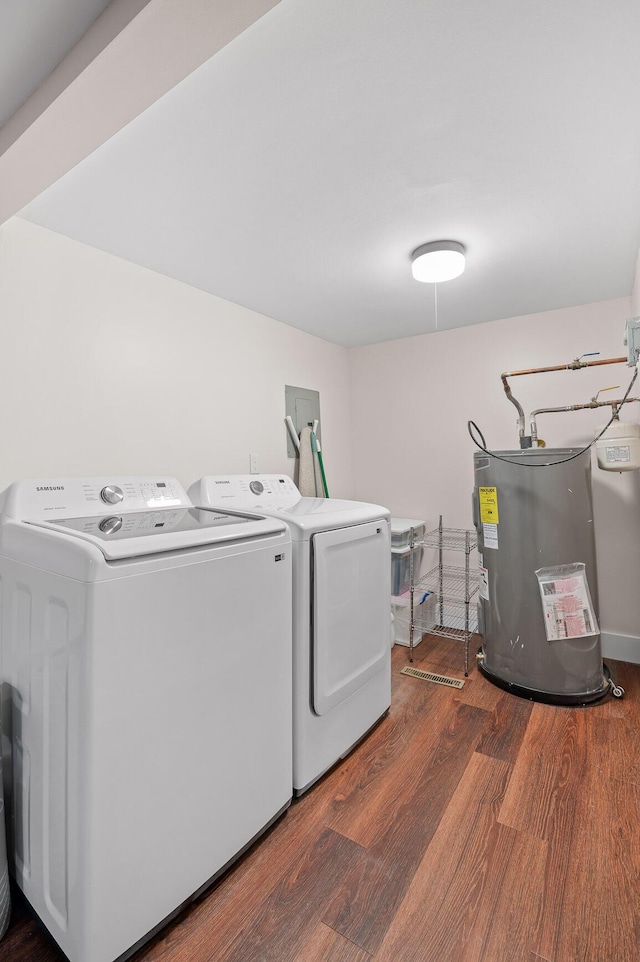 219 Martin Rd, Chattanooga, TN 37415 - laundry room with electric water heater, washing machine and clothes dryer, and wood finished floors