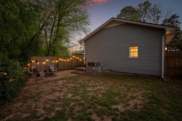 219 Martin Rd, Chattanooga, TN 37415 - back of property featuring central air condition unit and a fire pit
