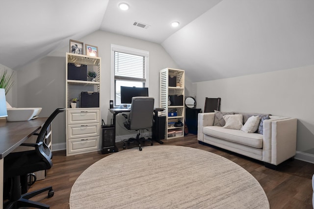 office with visible vents, baseboards, lofted ceiling, and dark wood-type flooring
