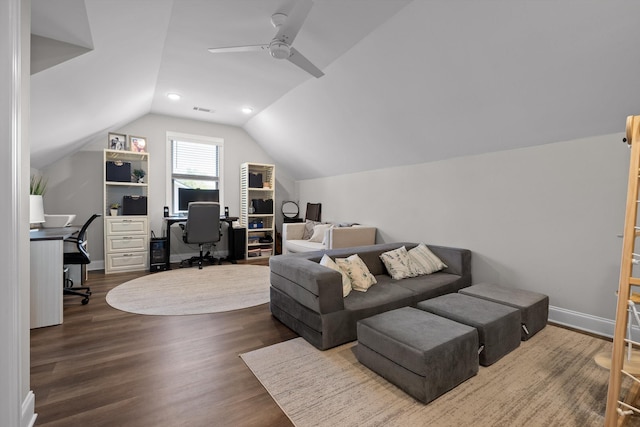 office space featuring vaulted ceiling, a ceiling fan, visible vents, and wood finished floors