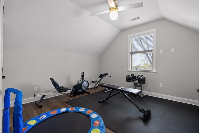exercise room featuring visible vents, baseboards, lofted ceiling, and ceiling fan