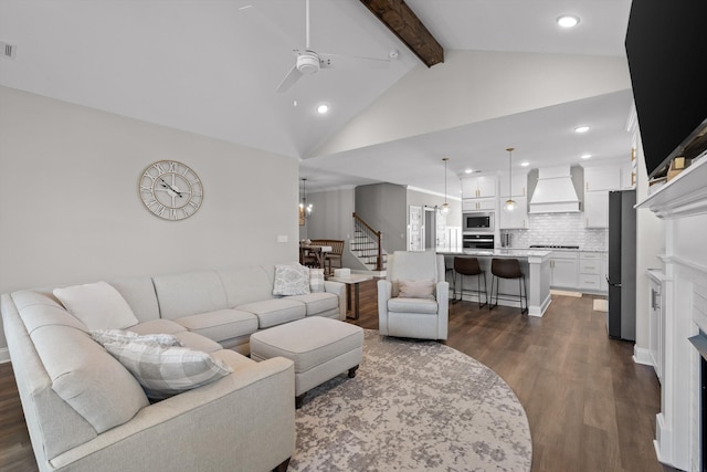 living area with recessed lighting, stairway, dark wood finished floors, and beam ceiling