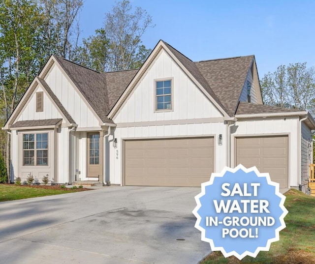 view of front of house featuring an attached garage, roof with shingles, and driveway
